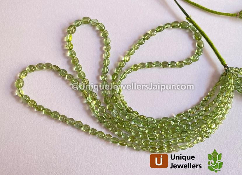 Basil Green Tourmaline Smooth Oval Beads