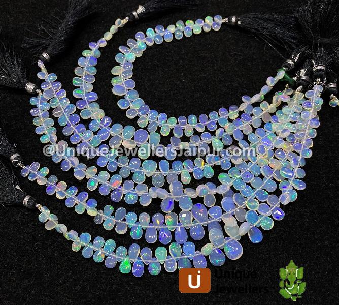 White Ethiopian Opal Smooth Pear Beads