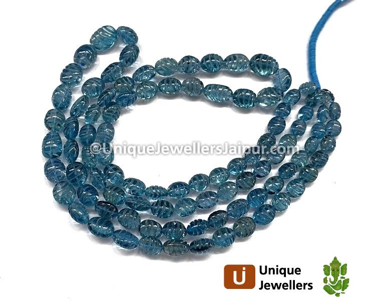 London Blue Topaz Carved Oval Beads