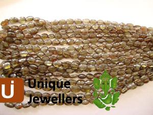 Andulosite Faceted Oval Beads