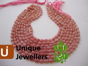 Pink Opel Faceted Oval Beads