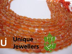 Carnelian Cut Carved Oval Beads