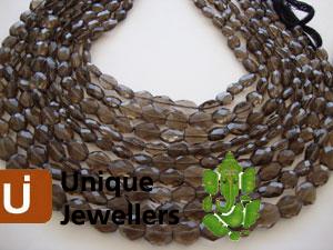 Smokey Faceted Oval Beads
